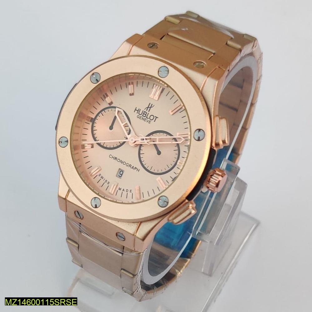 Gold Hublot watch on a light gray background