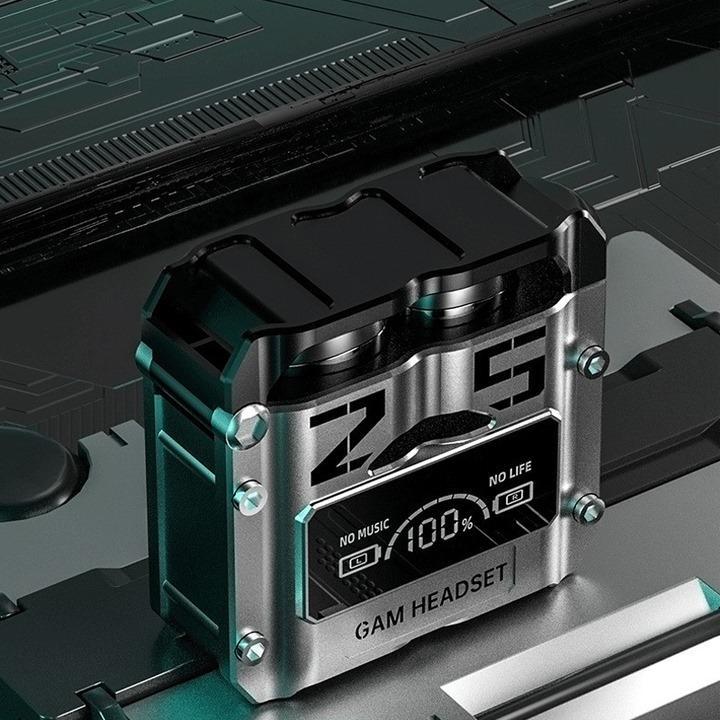 Gaming headset battery pack with digital display on a black and green gaming console.