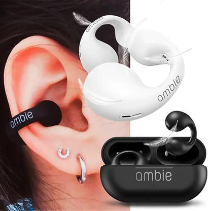 White wireless earbuds with 'ambie' branding in an open ear and charging case.