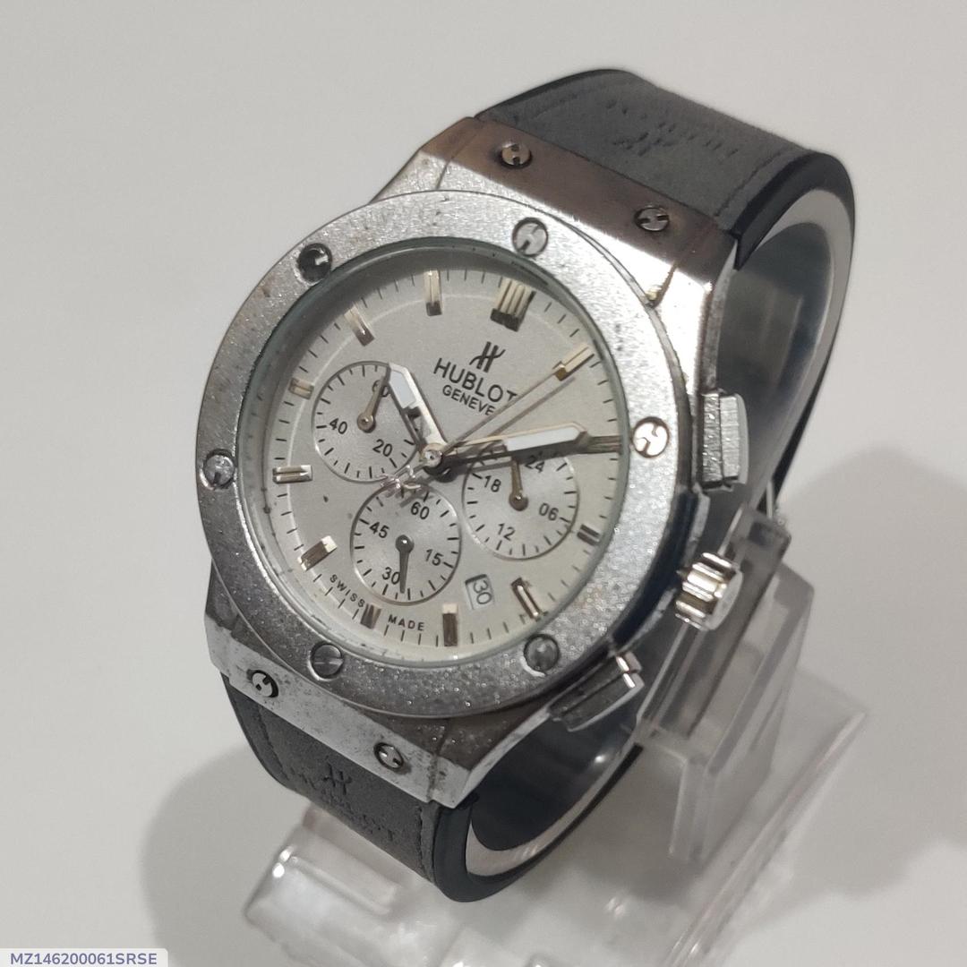 Hublot watch on a stand with a white background
