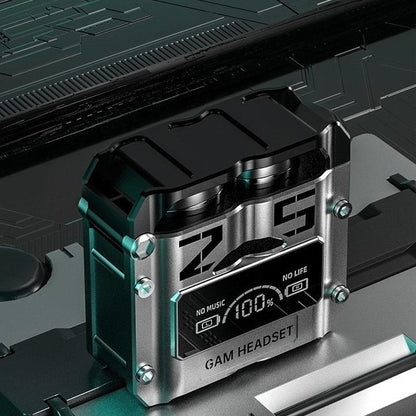 Gaming headset battery pack with digital display on a black and green gaming console.