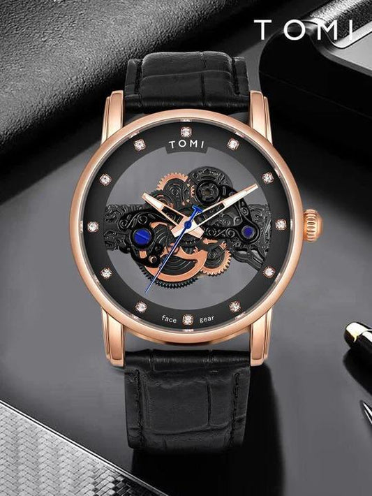 Luxury watch with black strap and rose gold case on a dark surface, brand 'TOMI' visible.